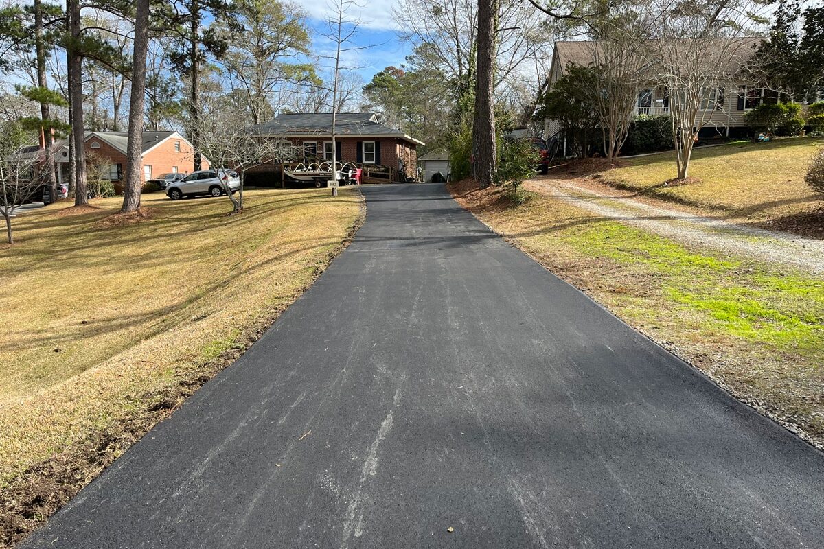 photo of newly paved asphalt residential driveway