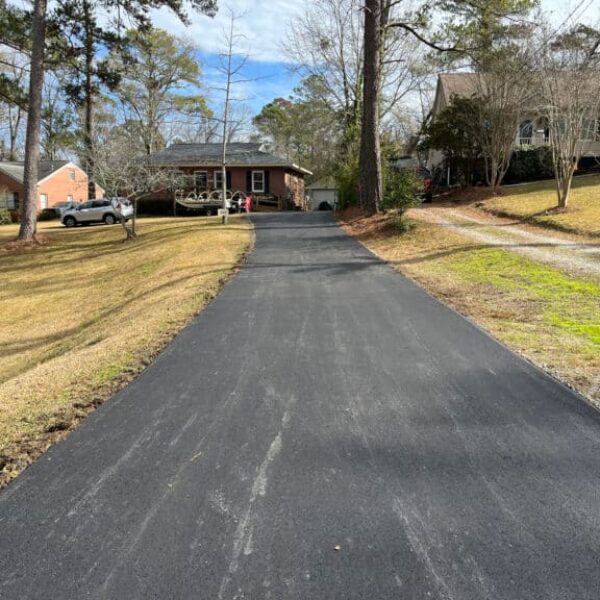 photo of newly paved asphalt residential driveway