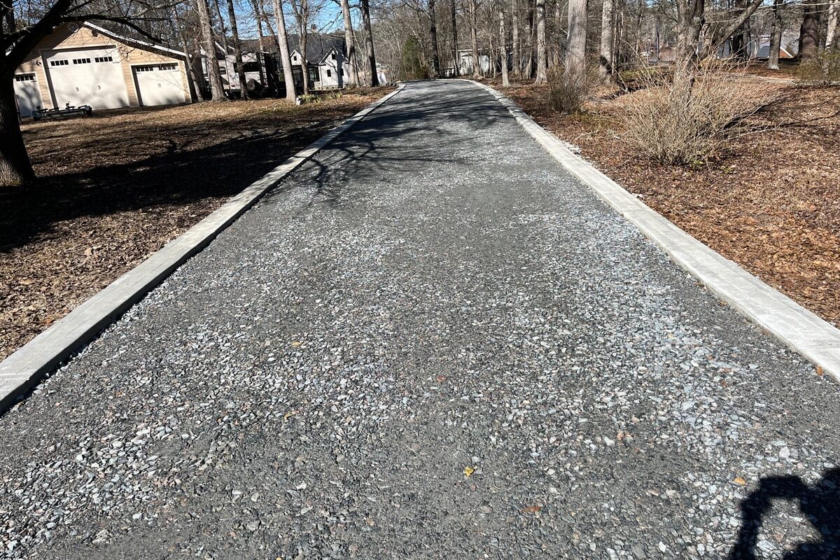 photo of newly paved asphalt residential driveway