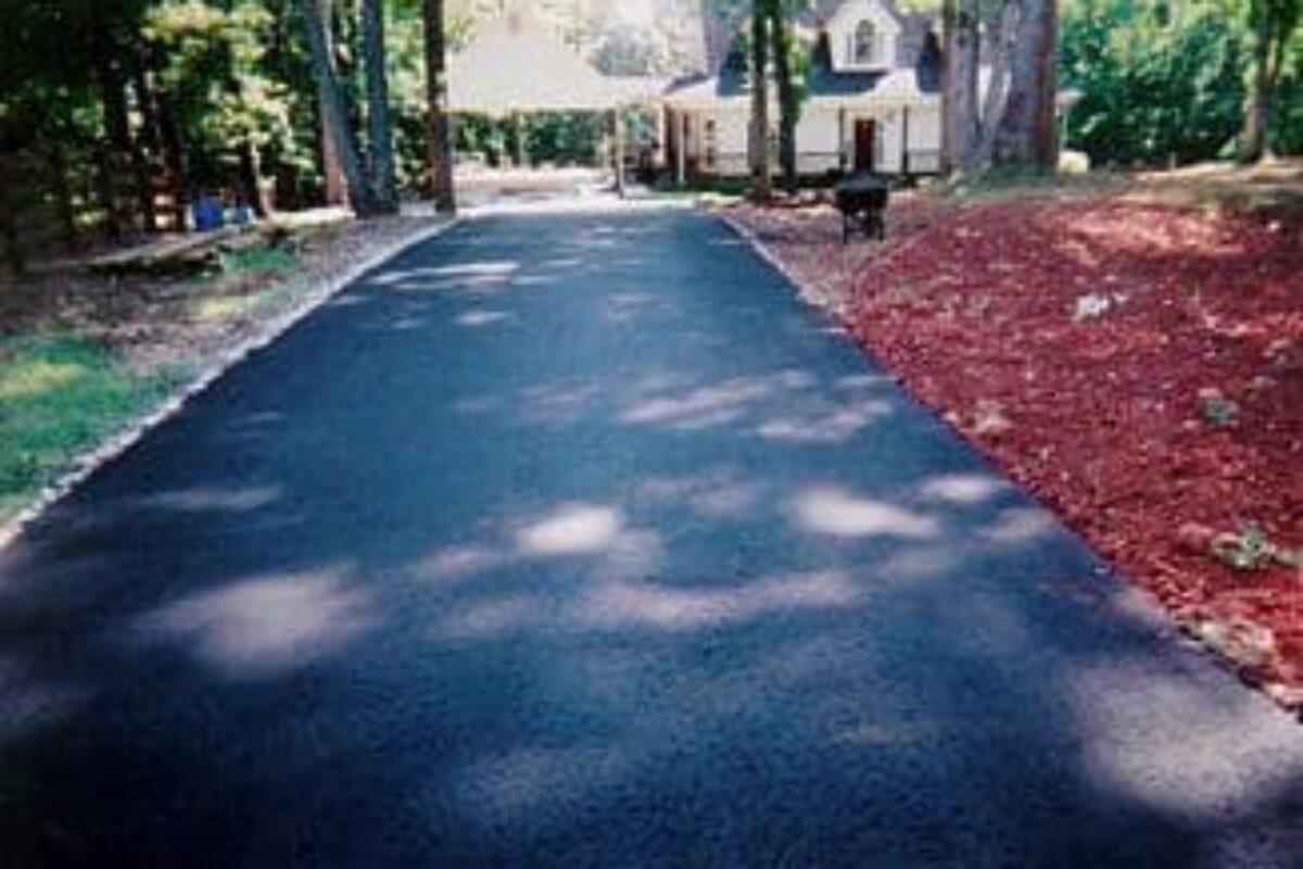 photo of newly asphalt paved residential driveway