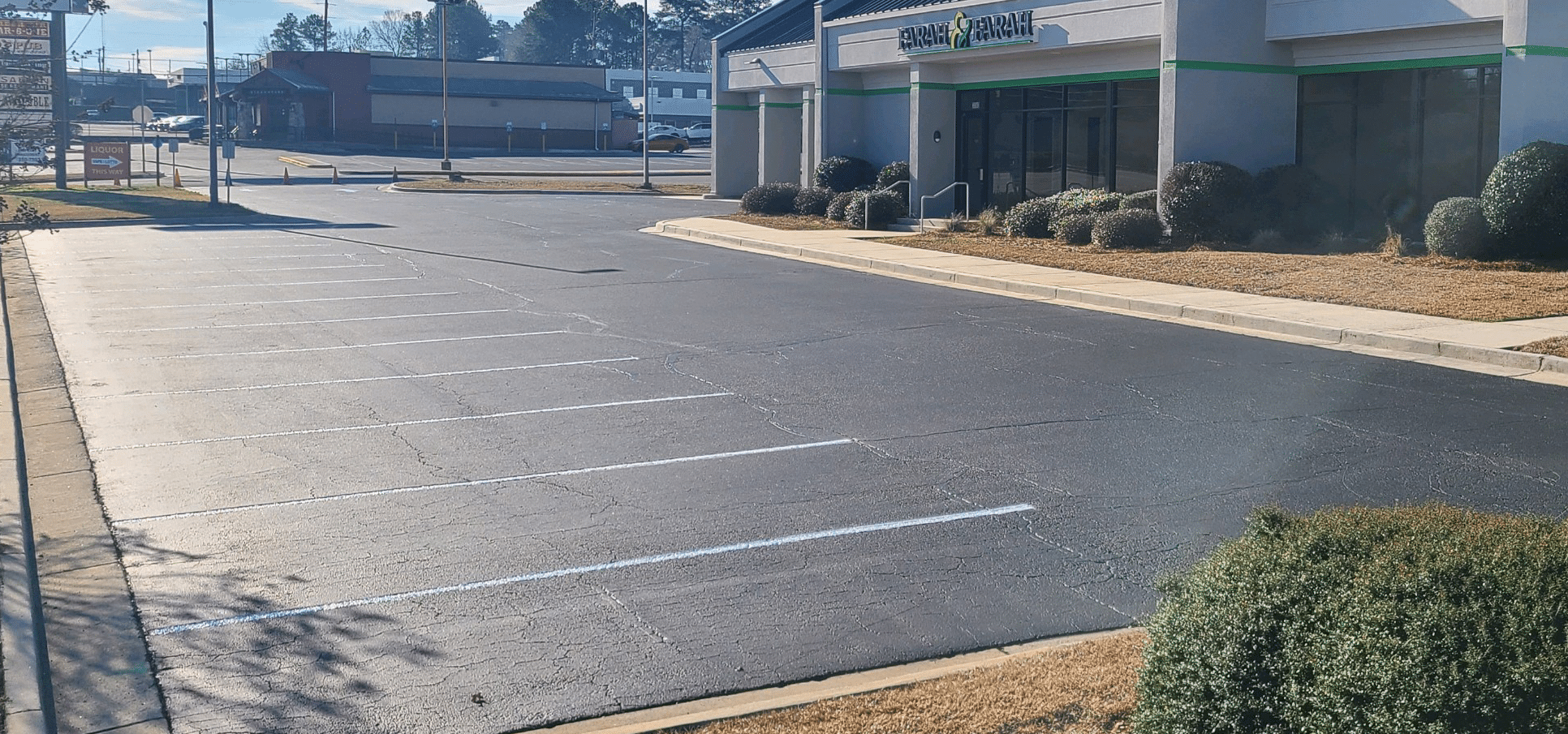 photo of newly sealcoated business parking lot